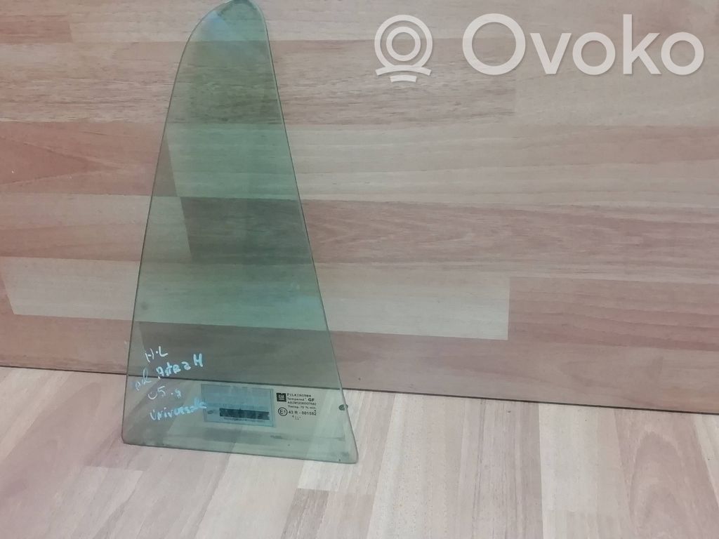 Opel Astra H Ventanilla de ventilación de la puerta trasera 
