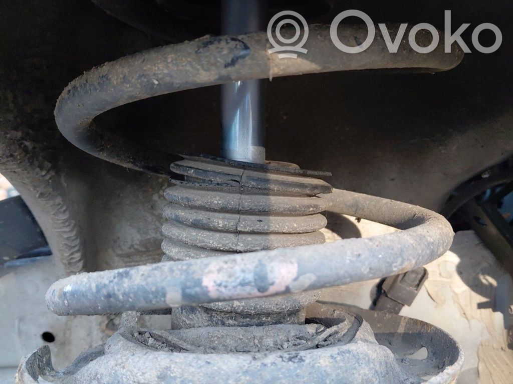 Renault Clio III Amortyzator osi przedniej ze sprężyną 