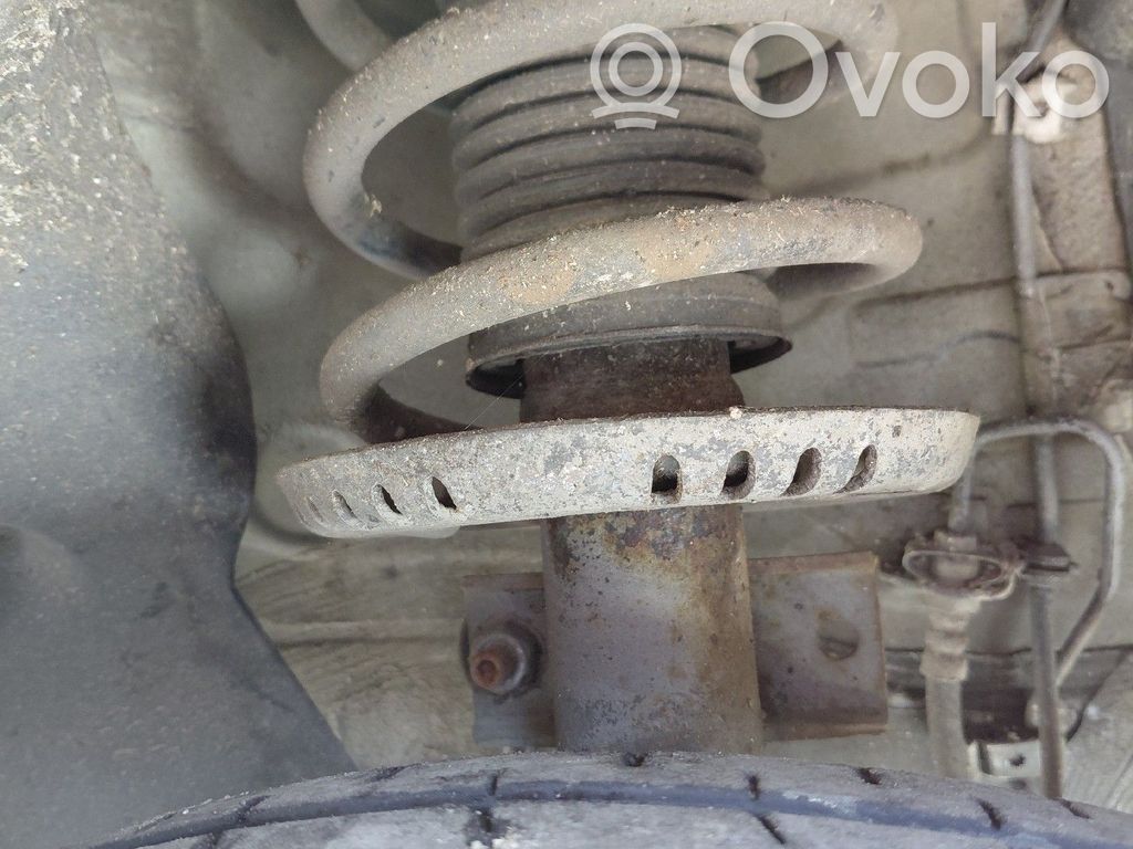 Volkswagen Polo IV 9N3 Amortyzator osi przedniej ze sprężyną 