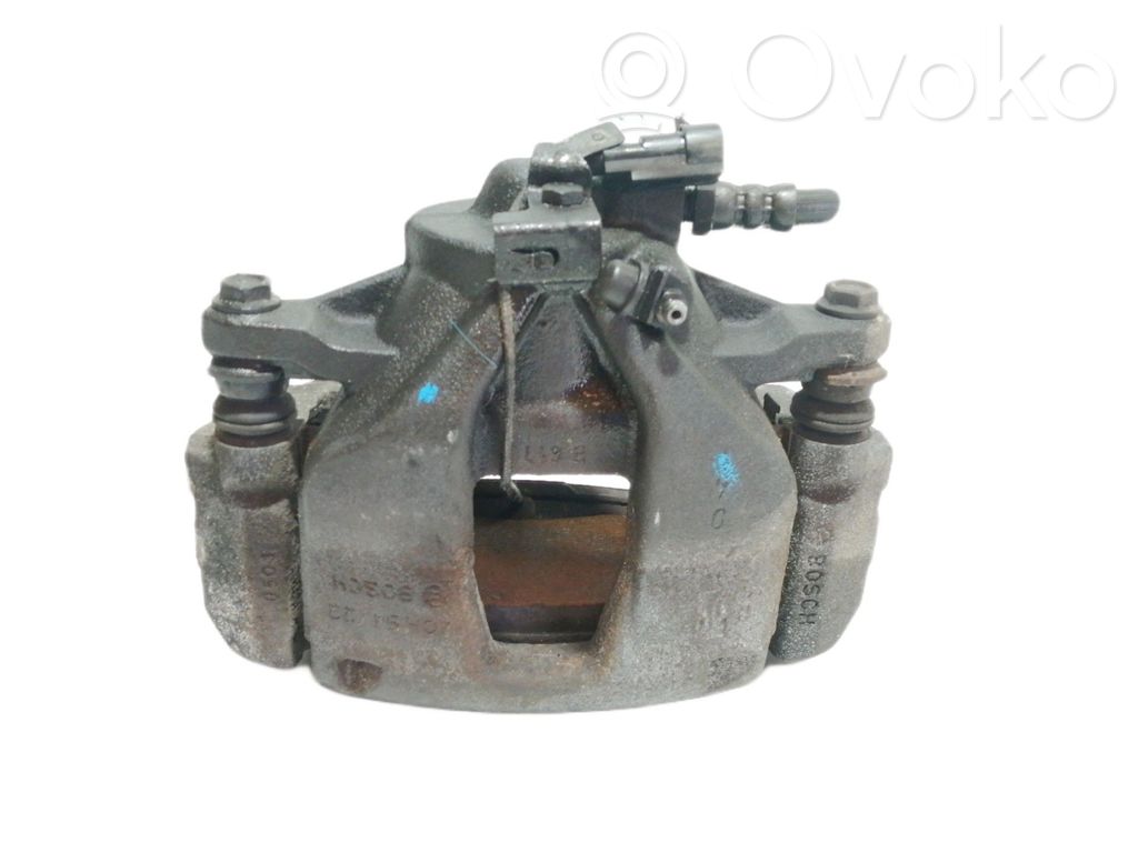 Opel Combo D Front brake caliper 