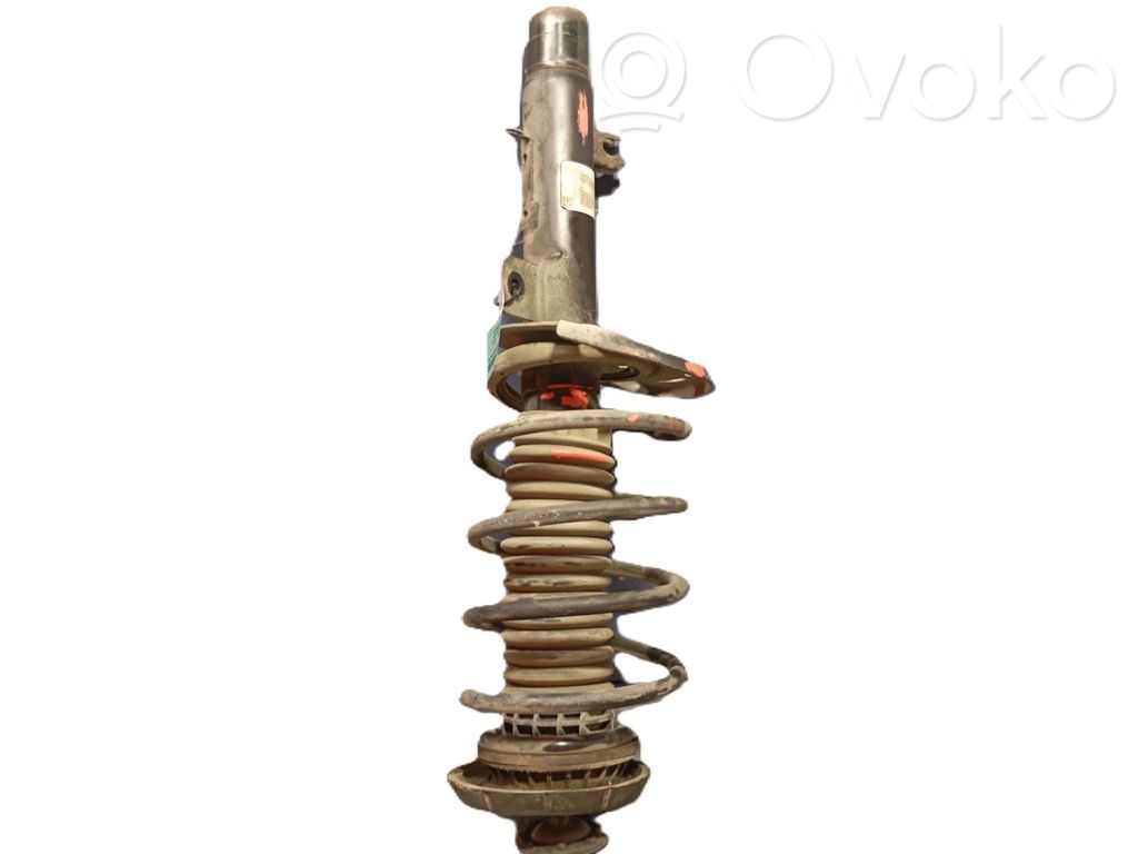 Peugeot 208 I Front shock absorber with coil spring 