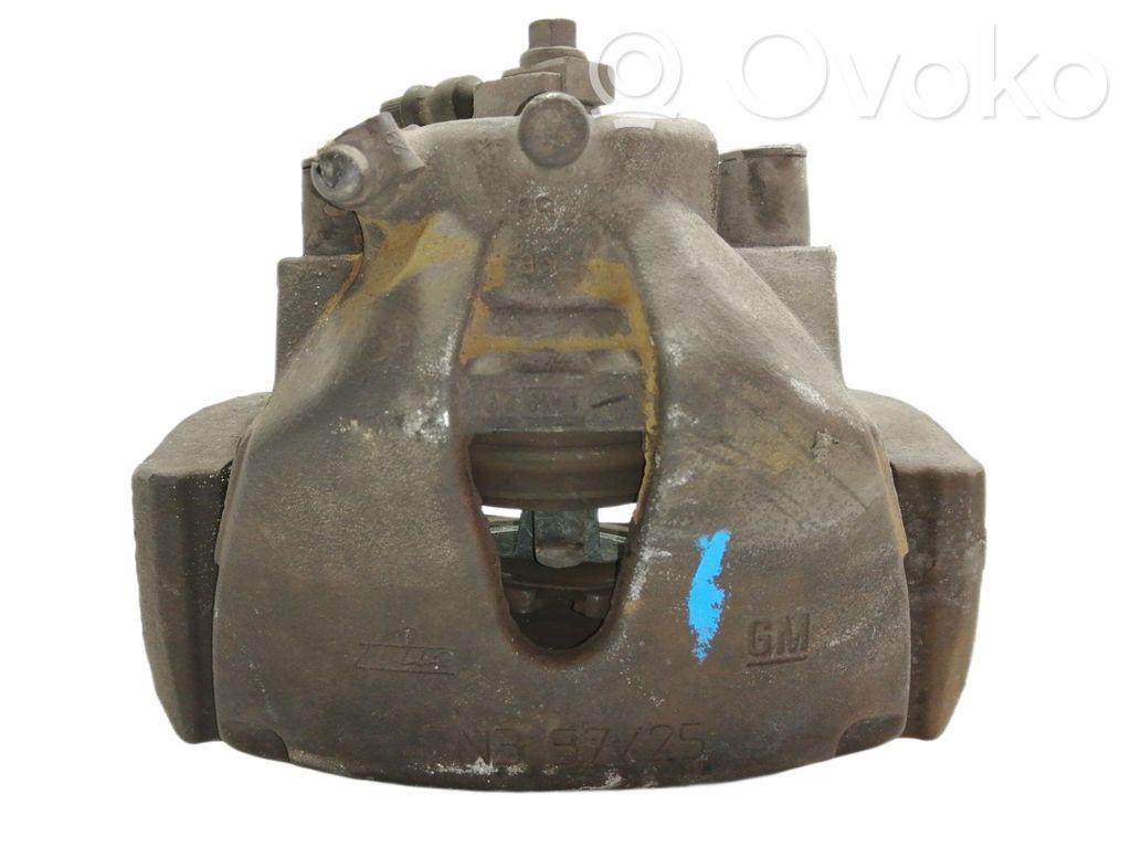 Opel Astra G Zacisk hamulcowy przedni