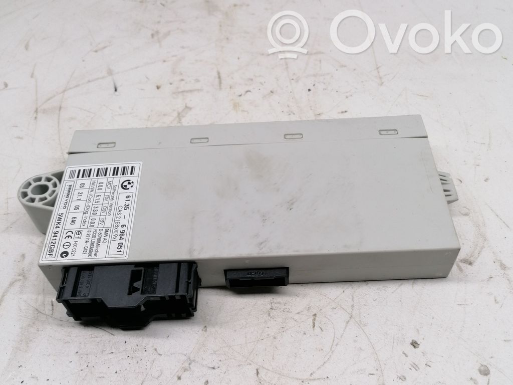 BMW 1 E81 E87 Komforto modulis 