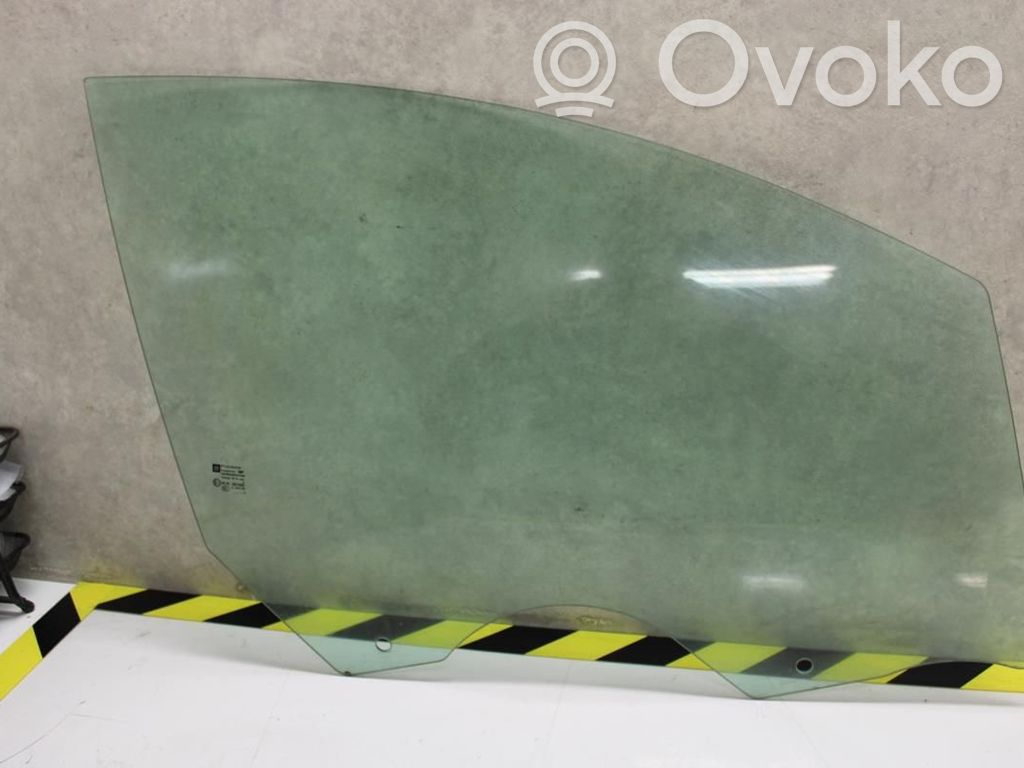 Opel Astra J Szyba drzwi przednich 