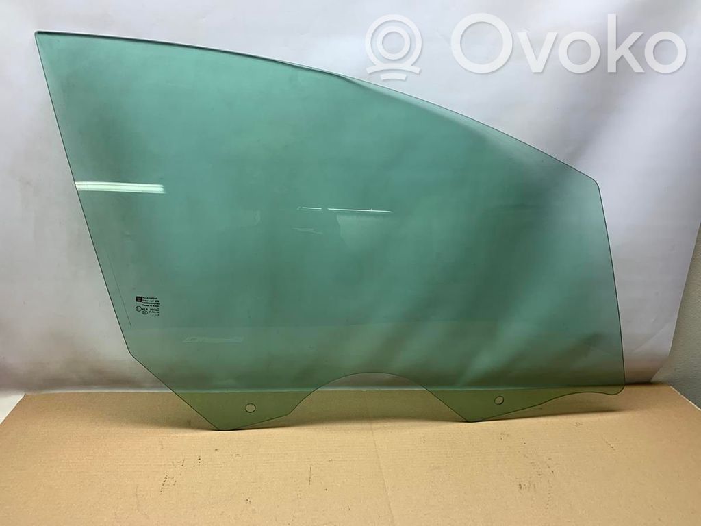 Opel Astra J Szyba drzwi przednich 