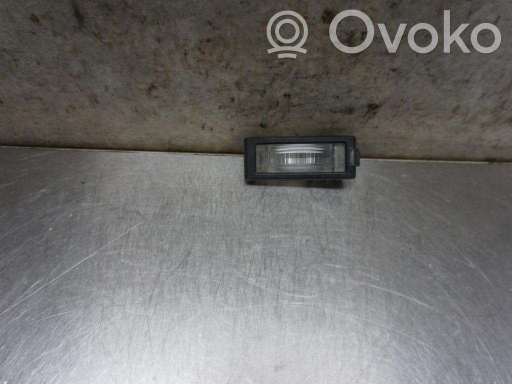 Opel Astra J Éclairage de plaque d'immatriculation 