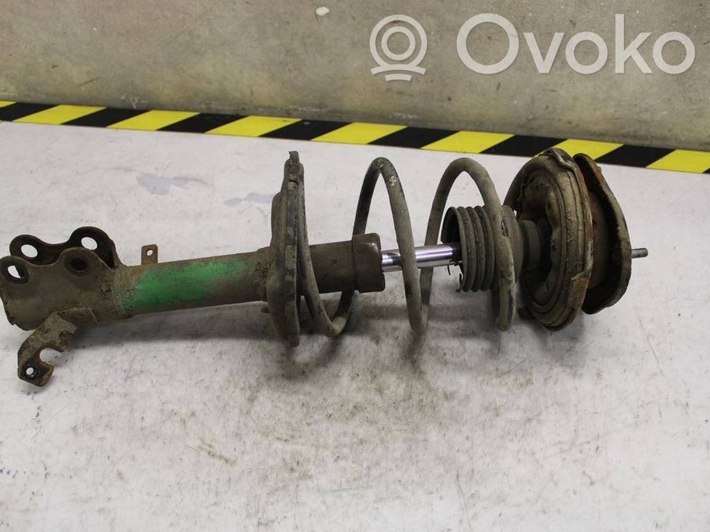 Toyota Corolla E110 Front shock absorber with coil spring 