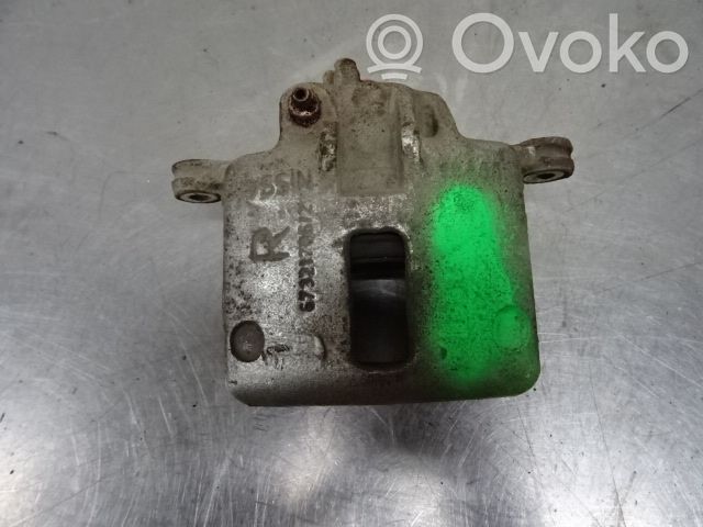 Nissan Micra Передний суппорт 