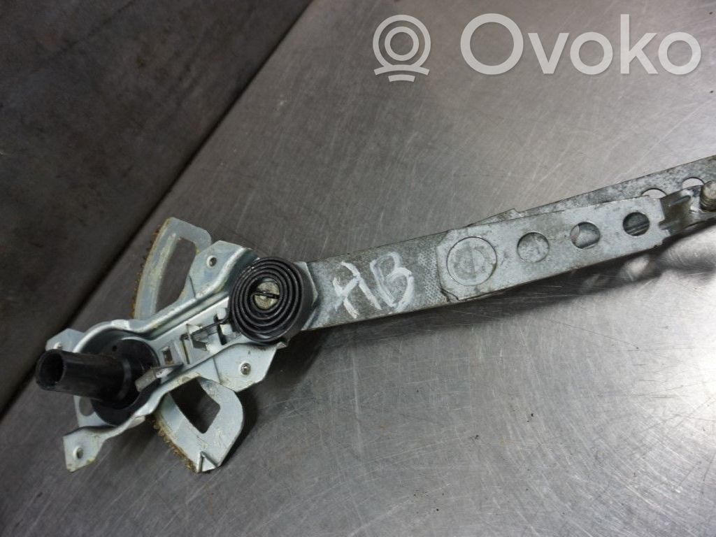 Volvo 940 Regulador manual de la ventanilla delantera 