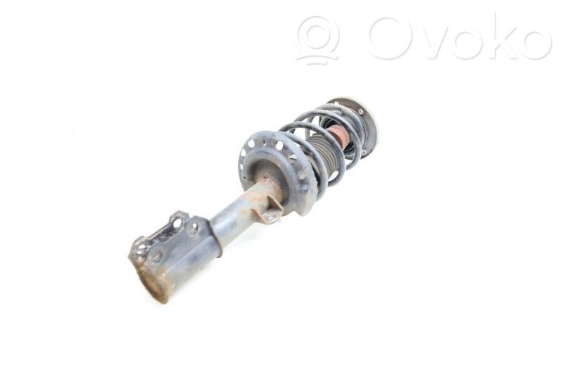 Front shock absorber with coil spring
