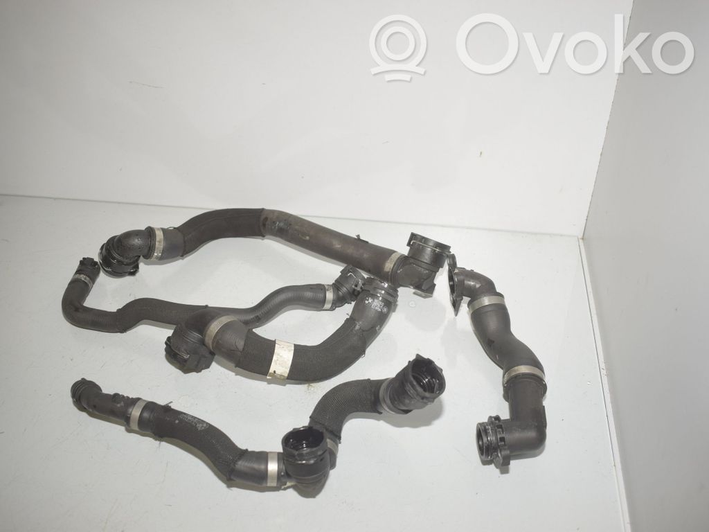 Conductă/furtun lichid de răcire motor   9896554,9896567,5A0C5A5,11539896554,11539896567,17125A0C5A3,17125A0C5A5,5A0C5A3,64218832956,8832956