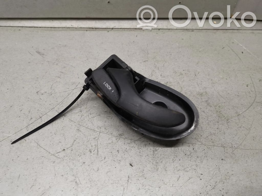 Rear door interior handle