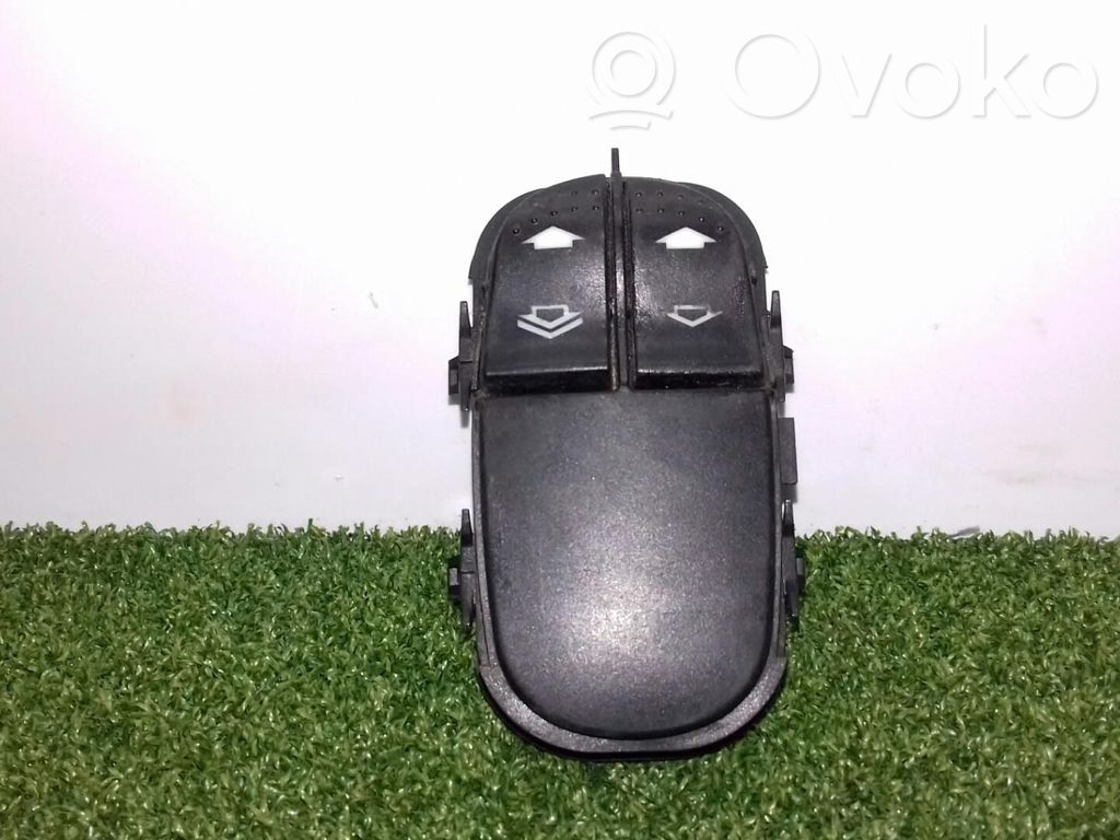Electric window control switch   YS4T14529AB