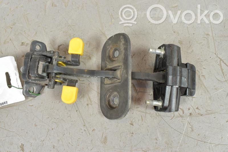Loading door check strap stopper   95509403