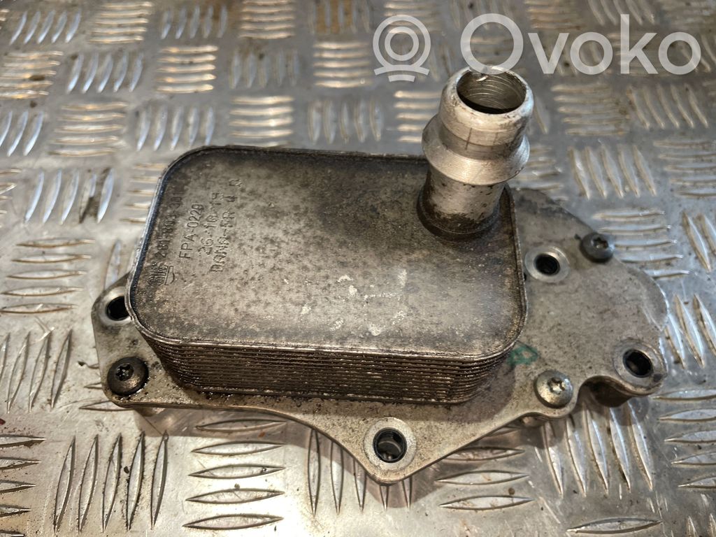 Opel Astra K Mocowanie / uchwyt filtra oleju 