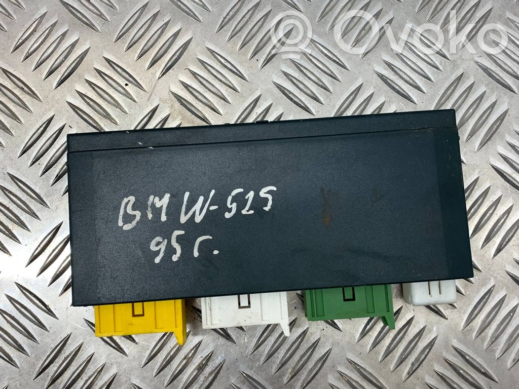 BMW 5 E34 Komforto modulis 