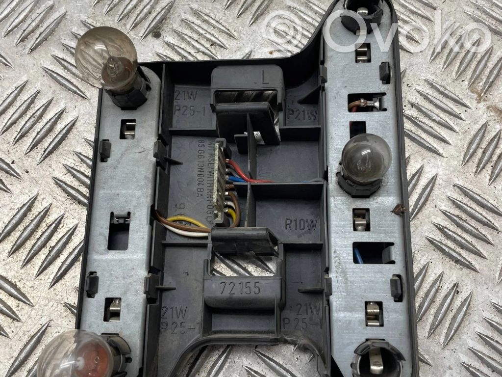 Ford Scorpio Takavalon polttimon suojan pidike 