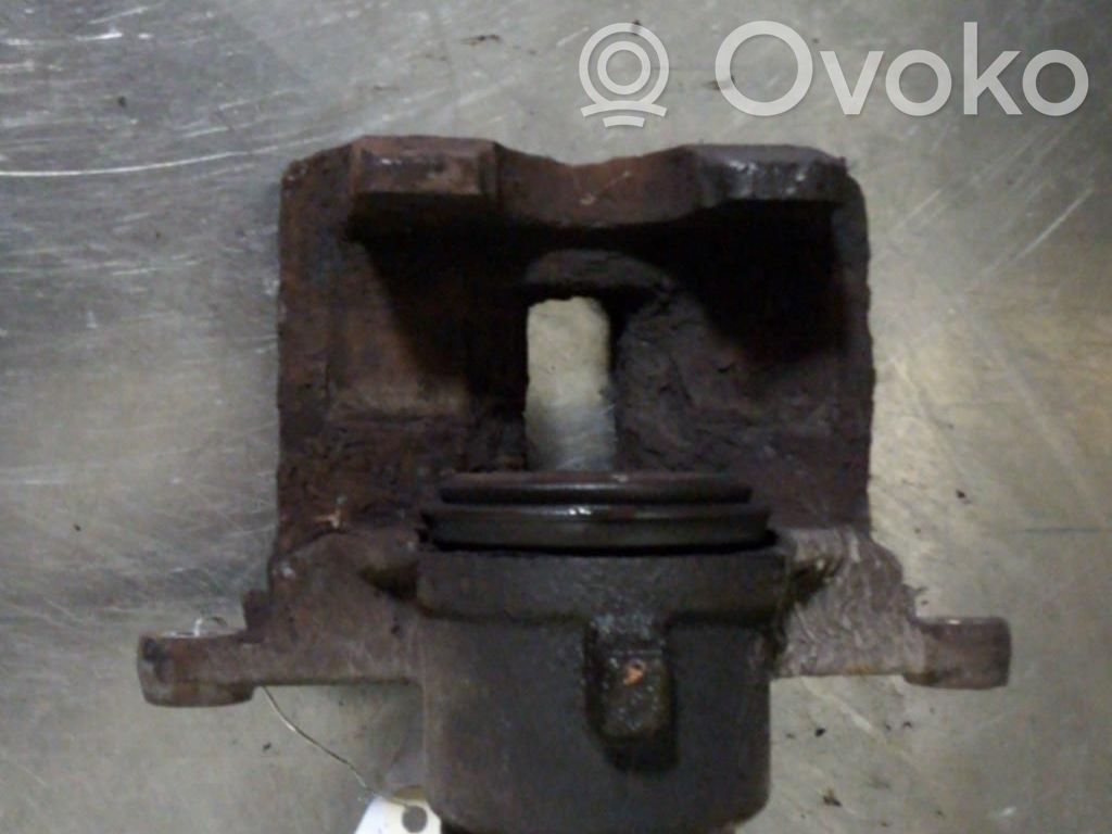 Toyota Corolla E120 E130 Zacisk hamulcowy przedni 