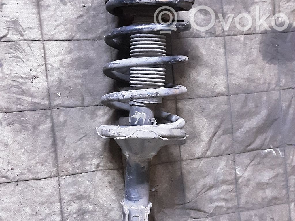 Front shock absorber with coil spring