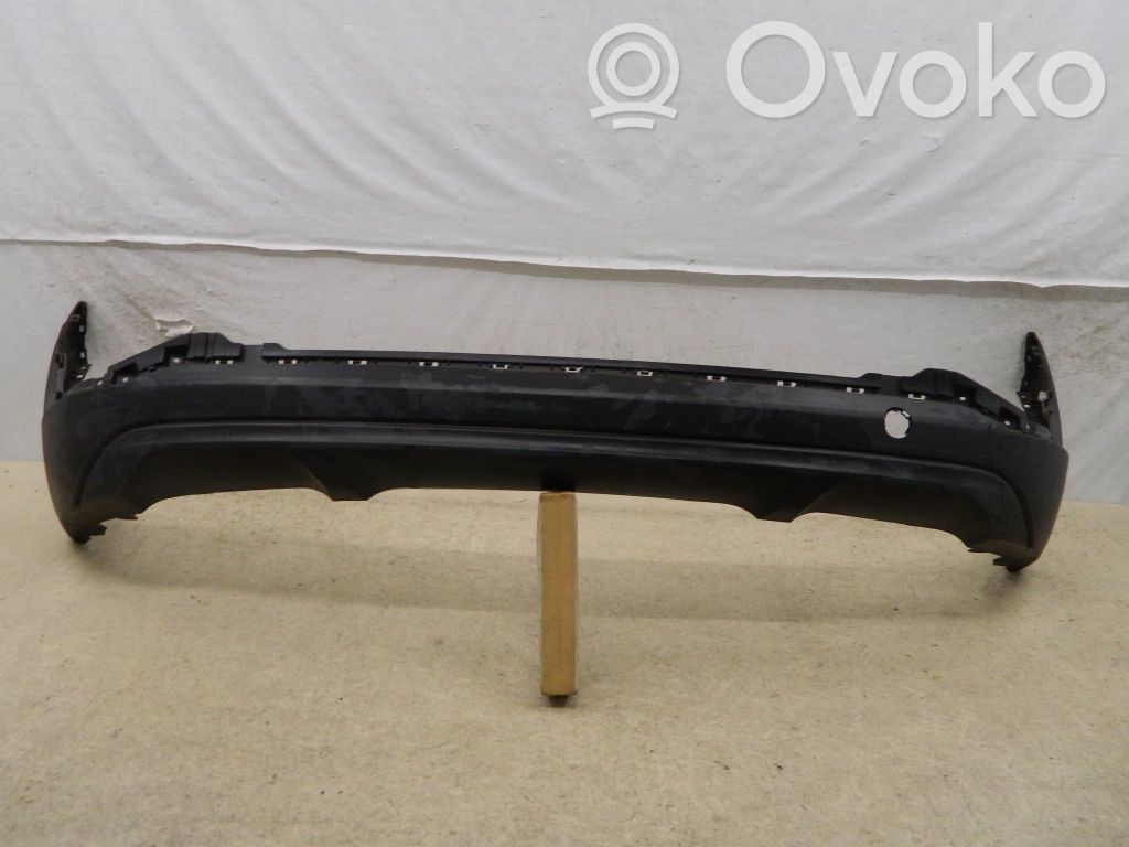 Volkswagen Golf VII Moldura inferior del parachoques trasero 