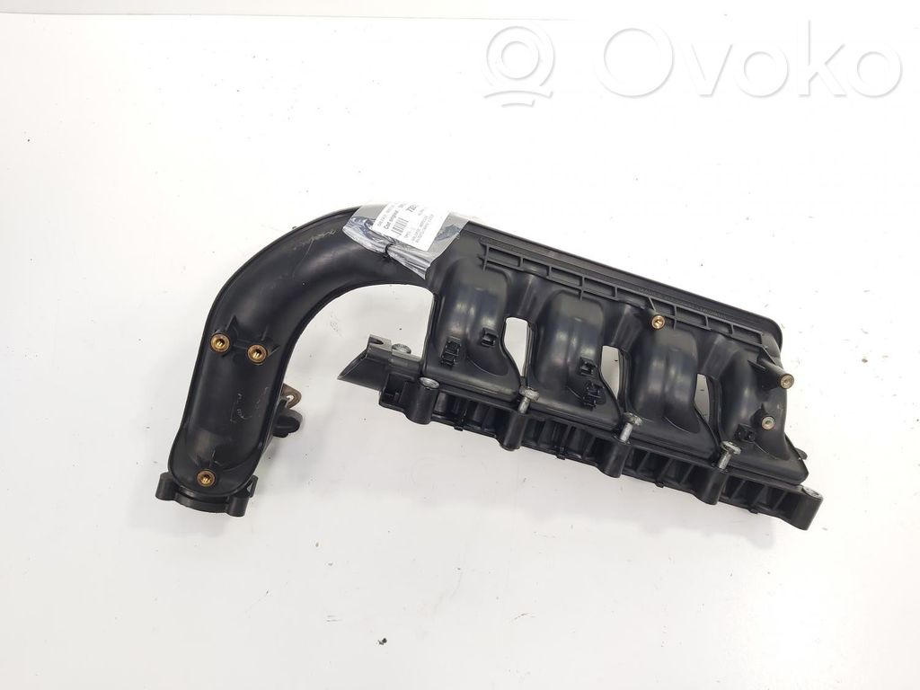 Opel Astra J Kolektor ssący