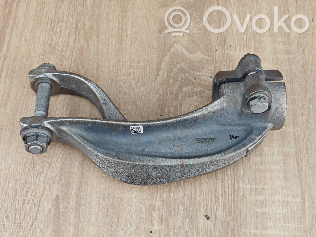 Mocowanie / Wspornik dolny amortyzatora osi przedniej   6876683
