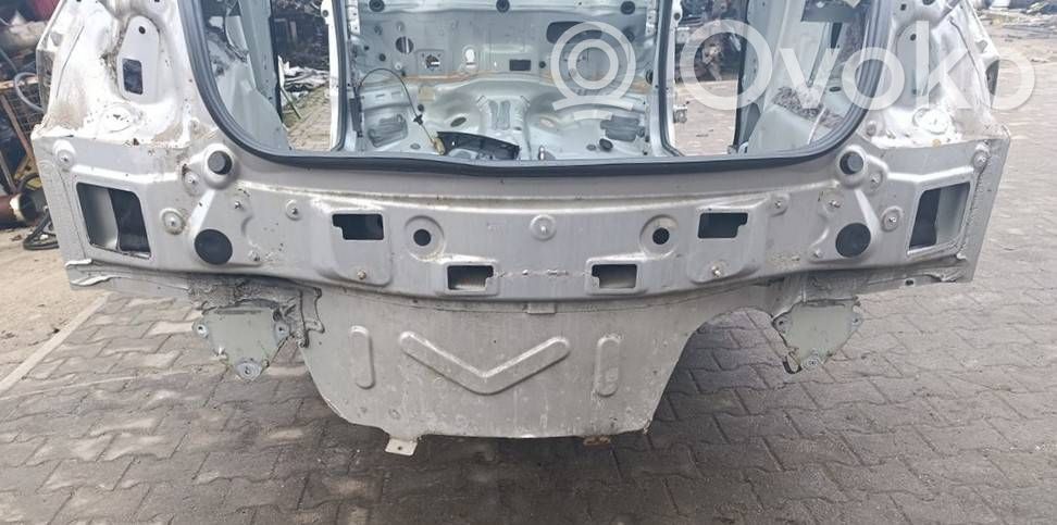 Trunk bottom trim panel