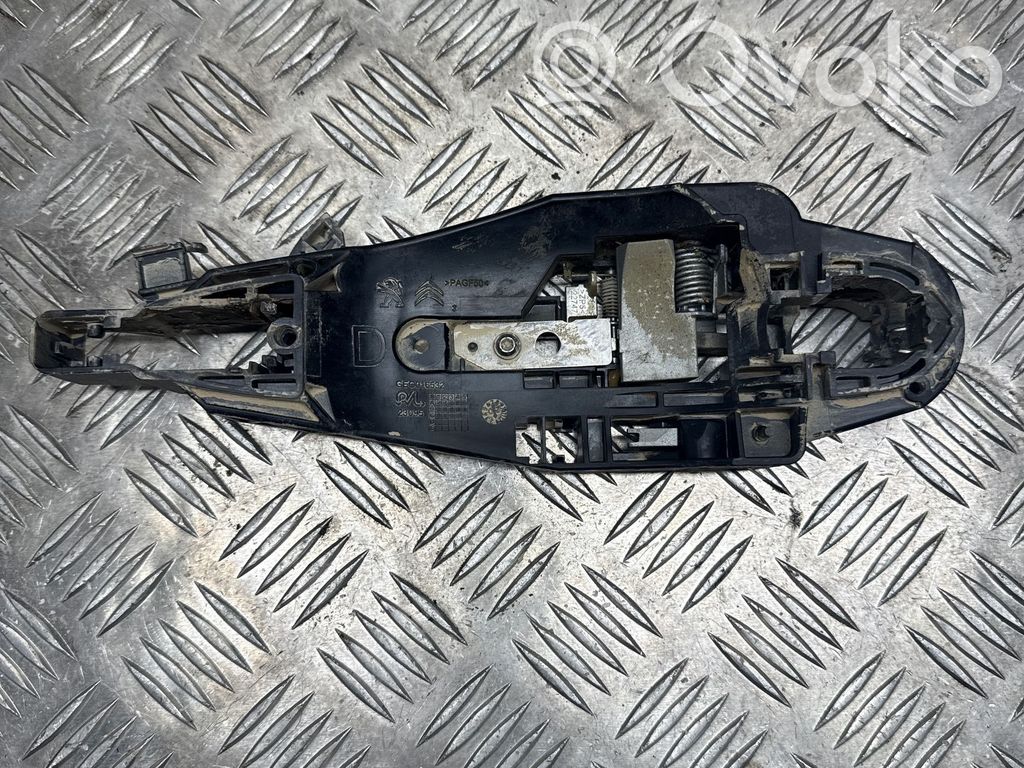 Opel Corsa F Klamka/wspornik zewnętrzny drzwi przednich 