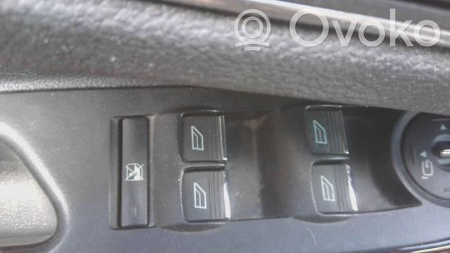 Electric window control switch   2032975