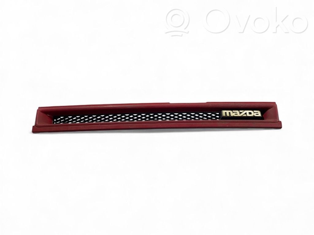 Mazda 121 Grille calandre supérieure de pare-chocs avant 