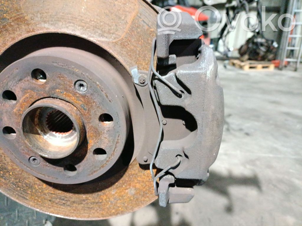 Opel Corsa E Front brake caliper 