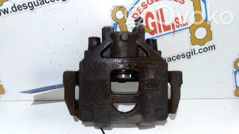 Toyota Yaris Zacisk hamulcowy przedni 