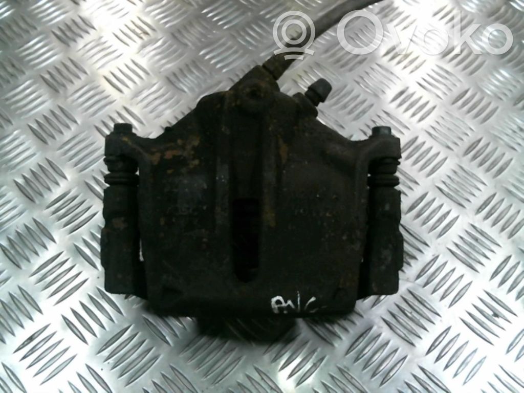 Ford Mondeo Mk III Zacisk hamulcowy przedni 