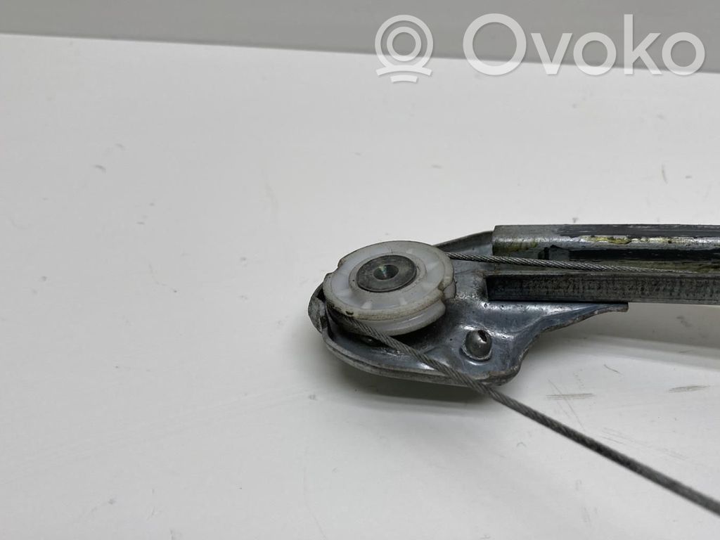 Opel Corsa C Regulador manual de la ventanilla trasera 