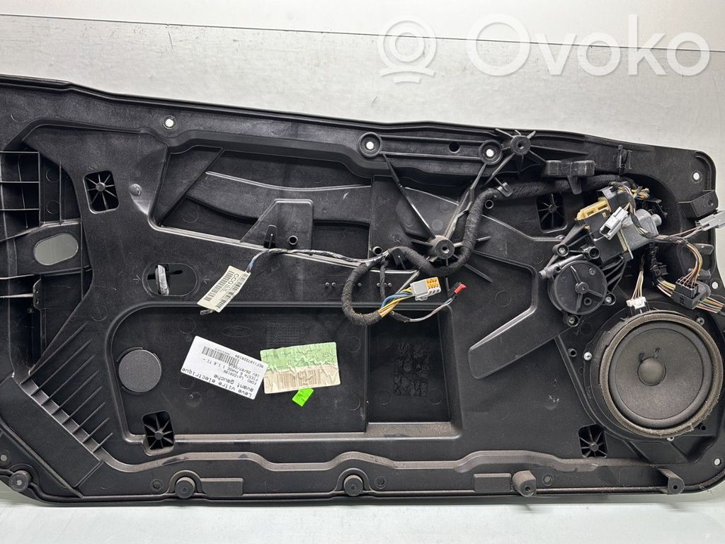 Ford Fiesta Elektryczny podnośnik szyby drzwi przednich 