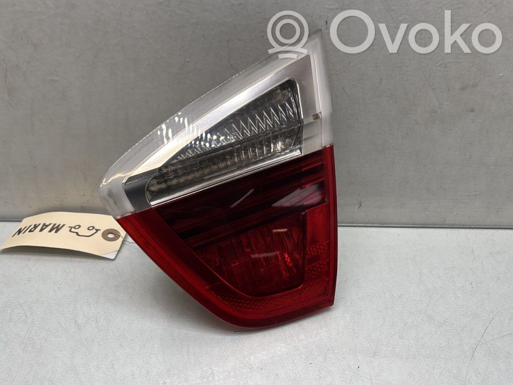 BMW 3 E90 E91 Aizmugurējais lukturis pārsegā 