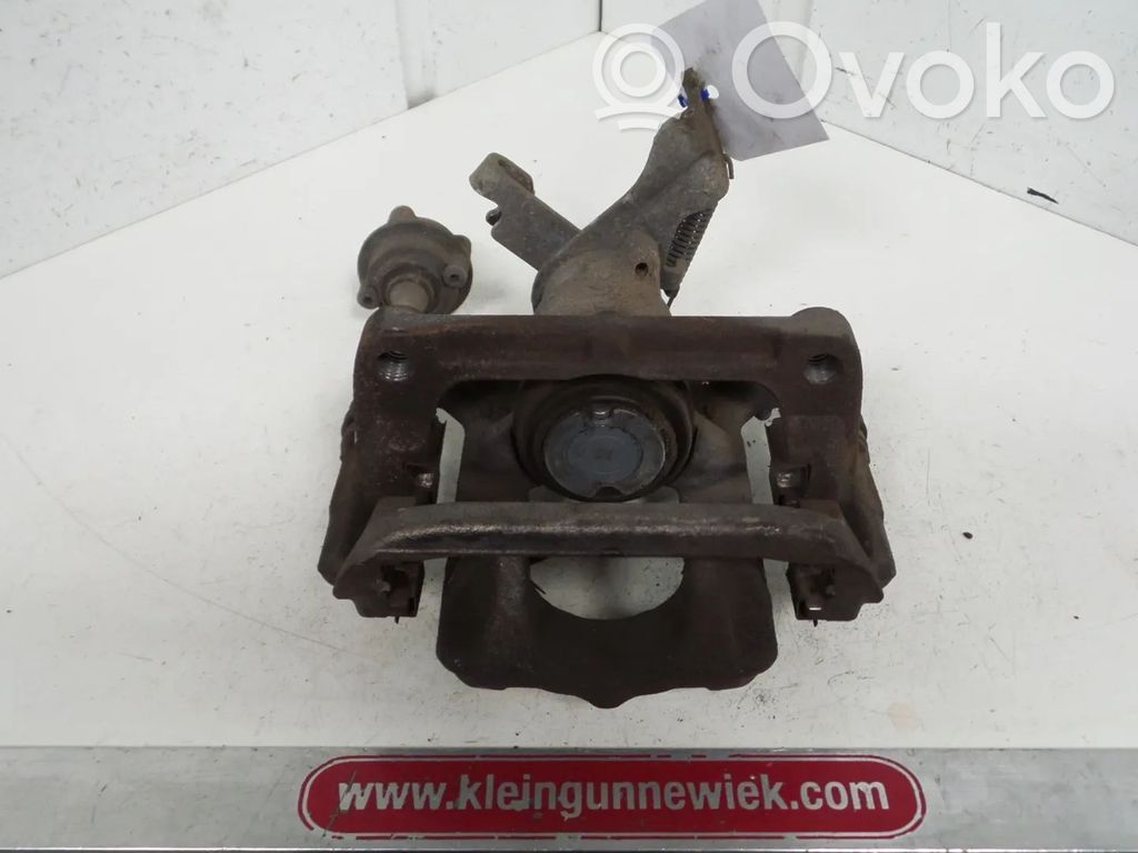 Opel Astra J Caliper del freno trasero 
