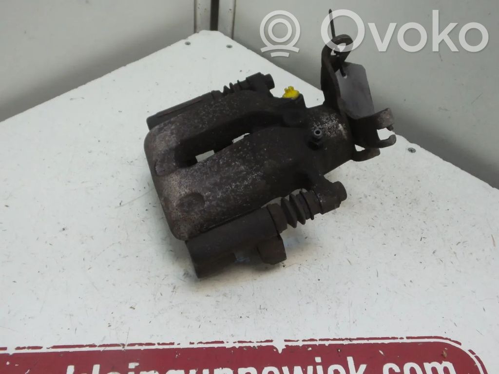 Opel Insignia A Tylny zacisk hamulcowy 