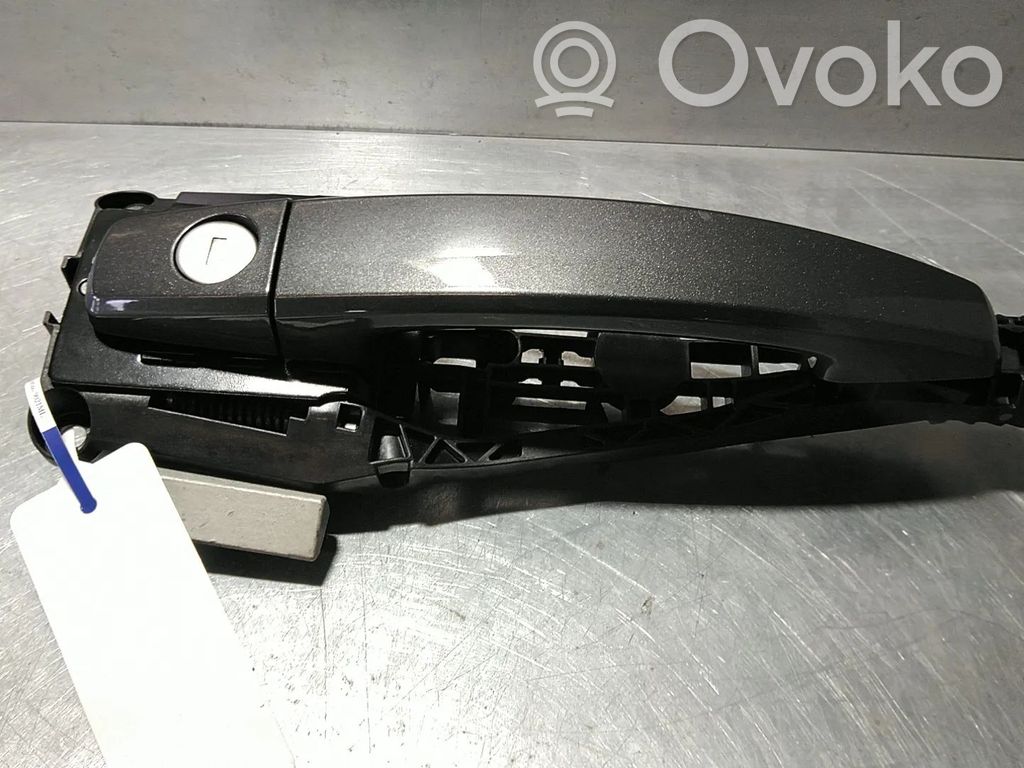 Opel Astra J Tapa manecilla puerta delantera 