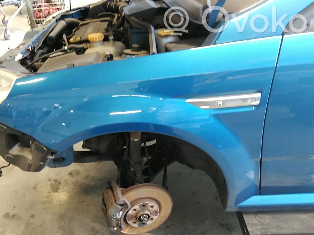 Opel Tigra B Błotnik przedni 
