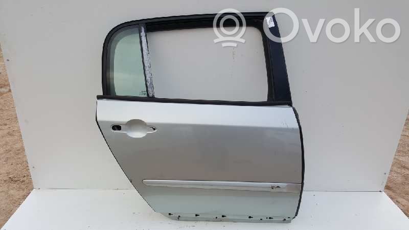 Puerta trasera   7751472404