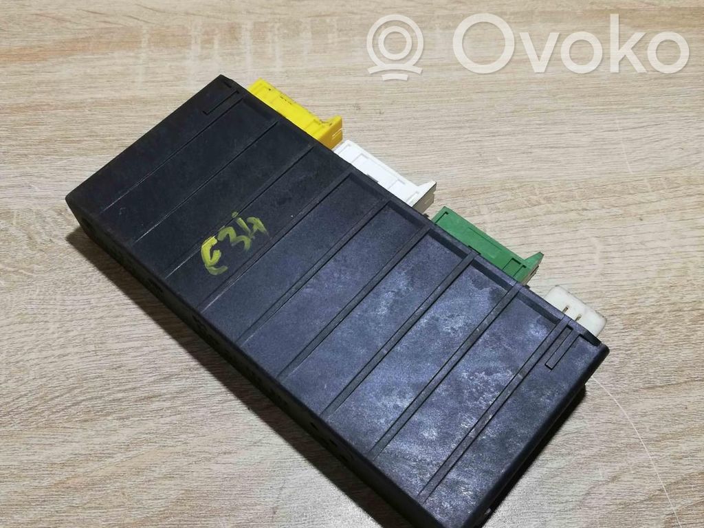 BMW 5 E34 Komforto modulis 