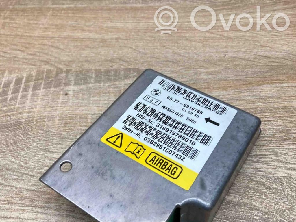 Airbag control unit/module   6919789,V37