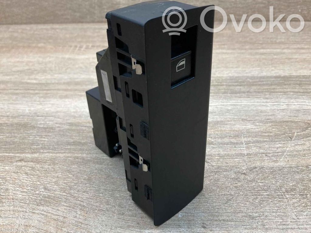Electric window control switch   6952800