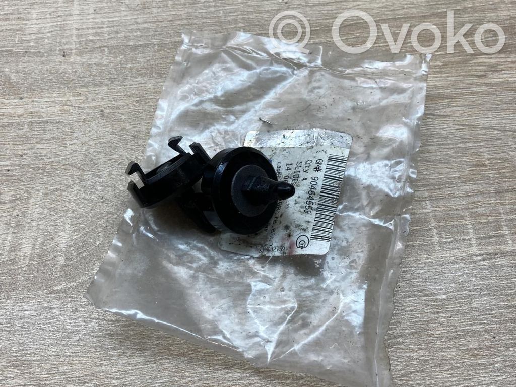 Opel Corsa C Uchwyt / Mocowanie zderzaka tylnego 