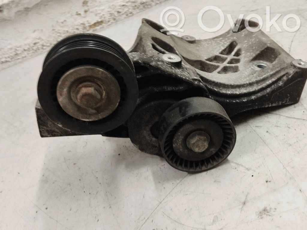 Opel Astra J Generator/alternator belt tensioner 