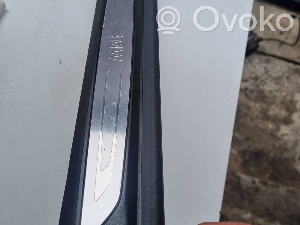 BMW 2 F46 Aizmugurējā sliekšņa dekoratīvā apdare (iekšējā) 