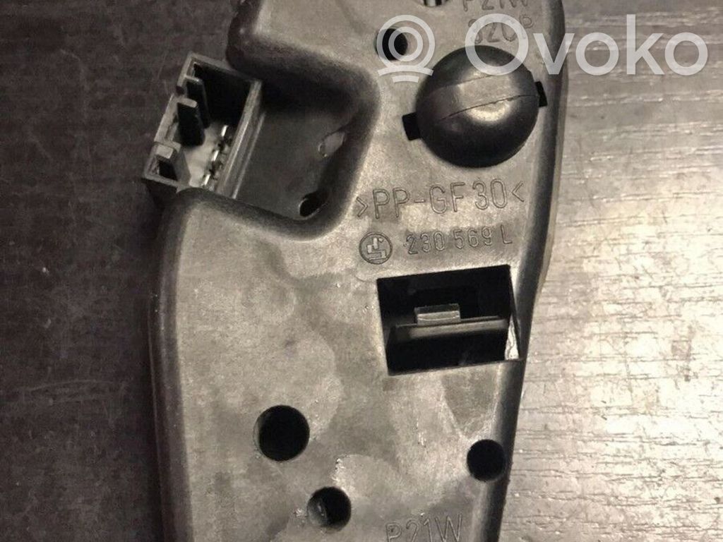 BMW 3 E46 Aizmugures spuldzes vāka turētājs 