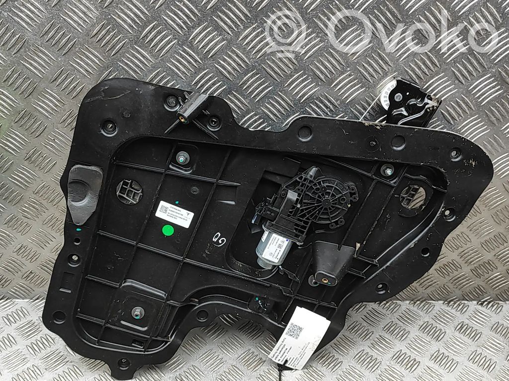 Tesla Model 3 Takaikkunan nostomekanismi ilman moottoria 