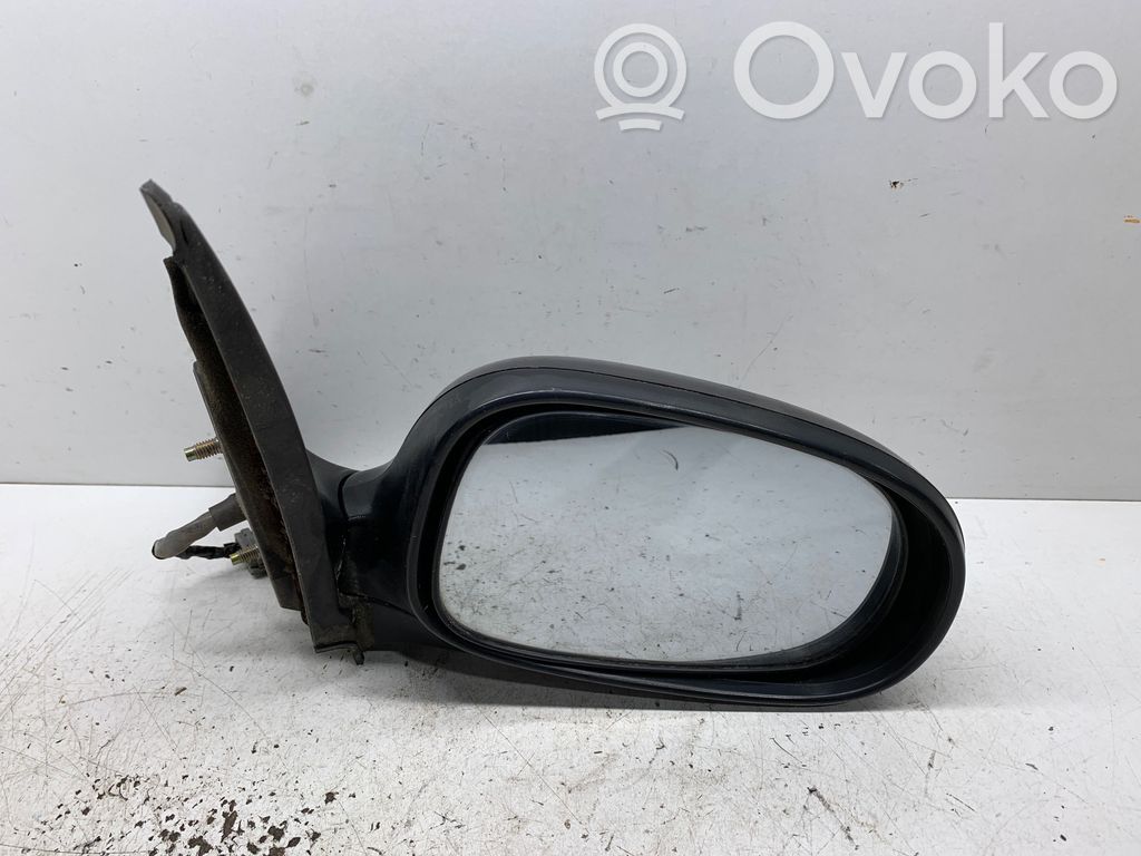Nissan Almera N16 Front door electric wing mirror 